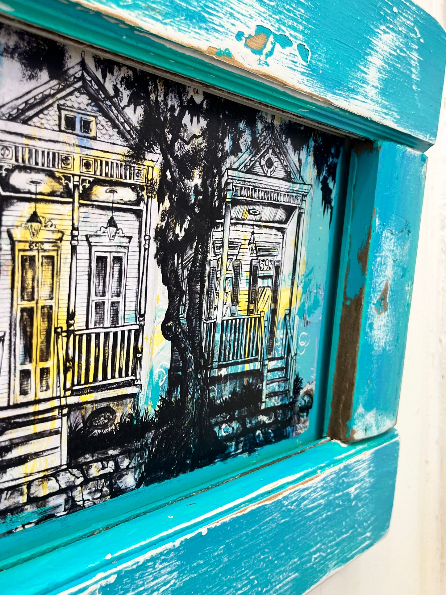 Double Shotgun with a Teal Reclaimed Wood Frame